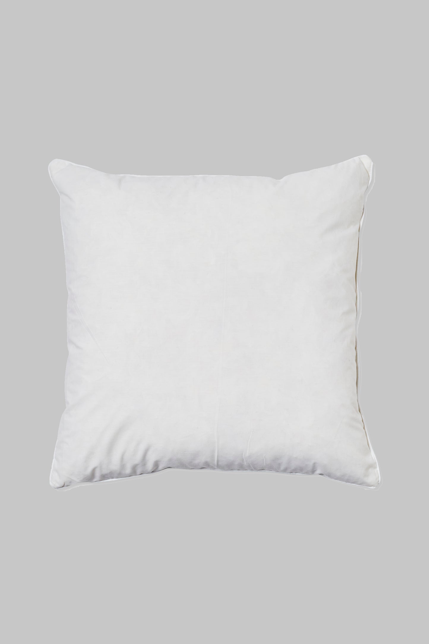 A white cushion pad designed for 45x45cm cushion covers.
