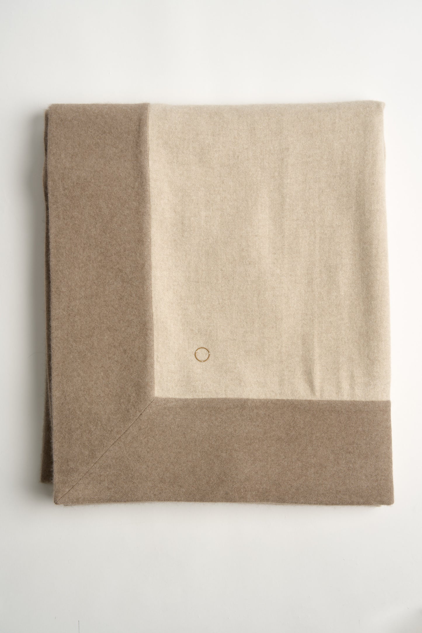 A flat lay image of the ETRA Big Bedspread in Beige & taupe