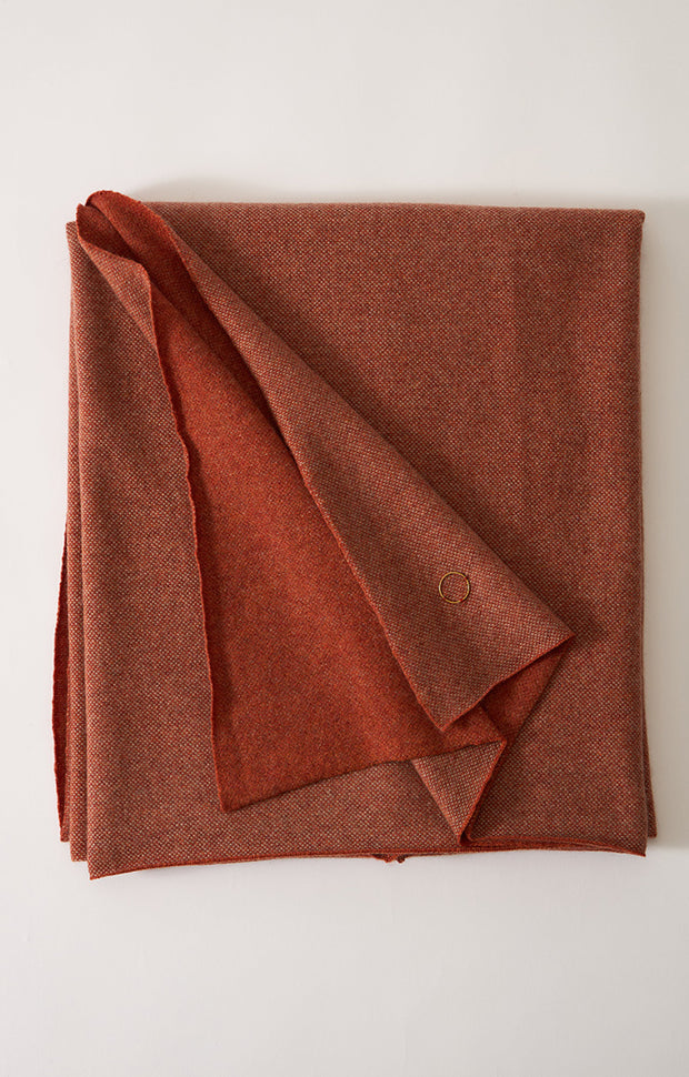 Manda cashmere knit throw in colours Fire & Taupe.