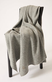 Maple cashmere knit throw in colour Soft Grey. 
