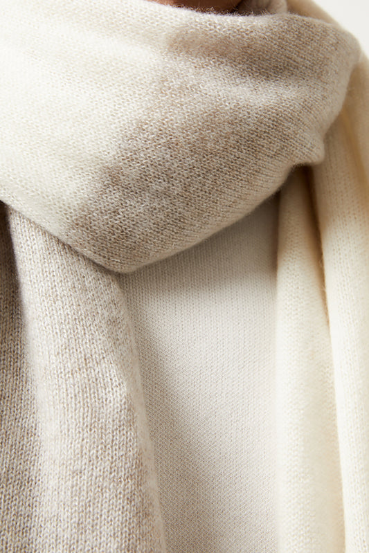Close-up of a beige scarf with a soft texture