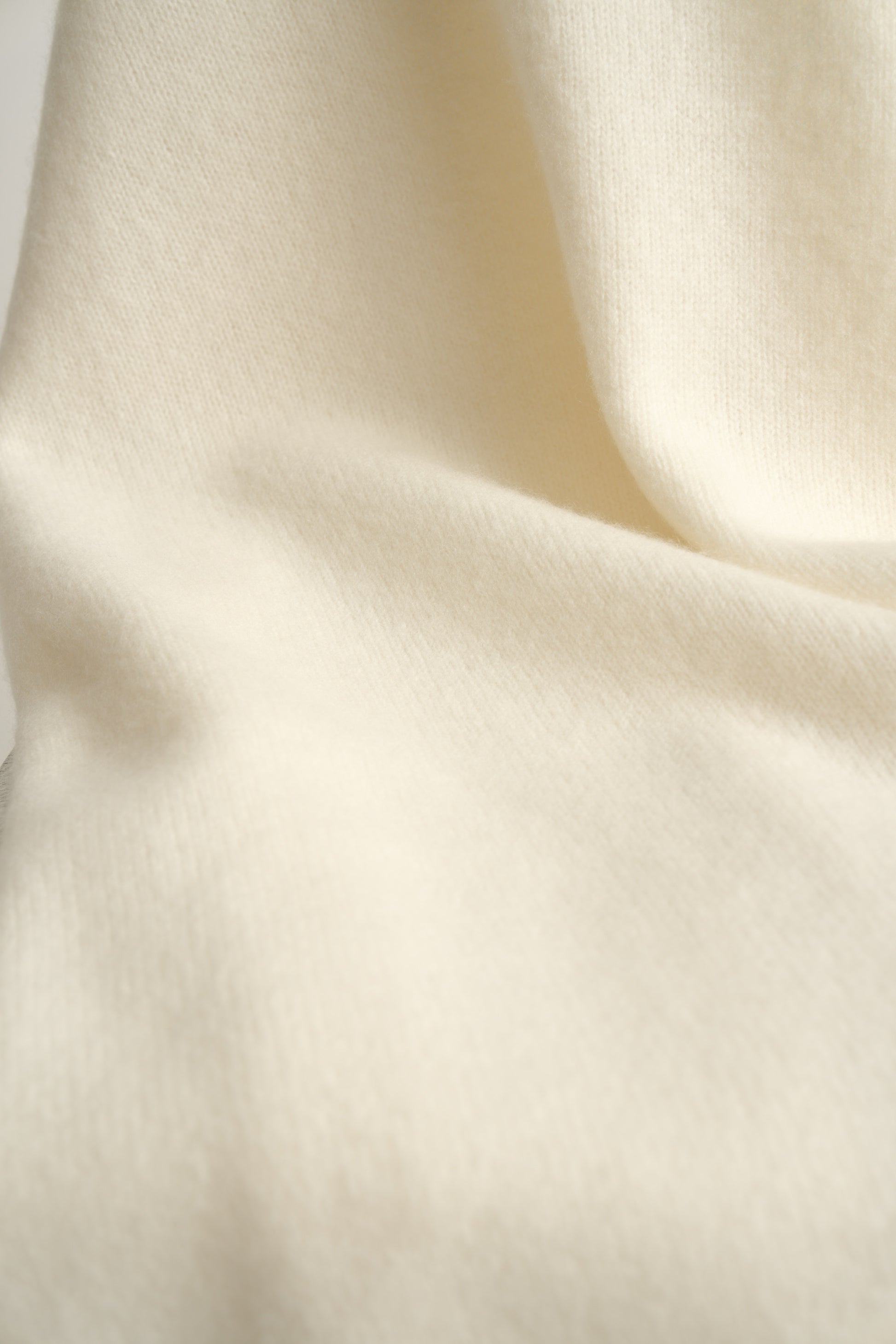 A closeup of the soft and luxurious Silence throw