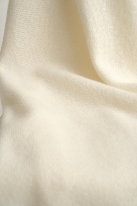 A closeup of the soft and luxurious Silence throw