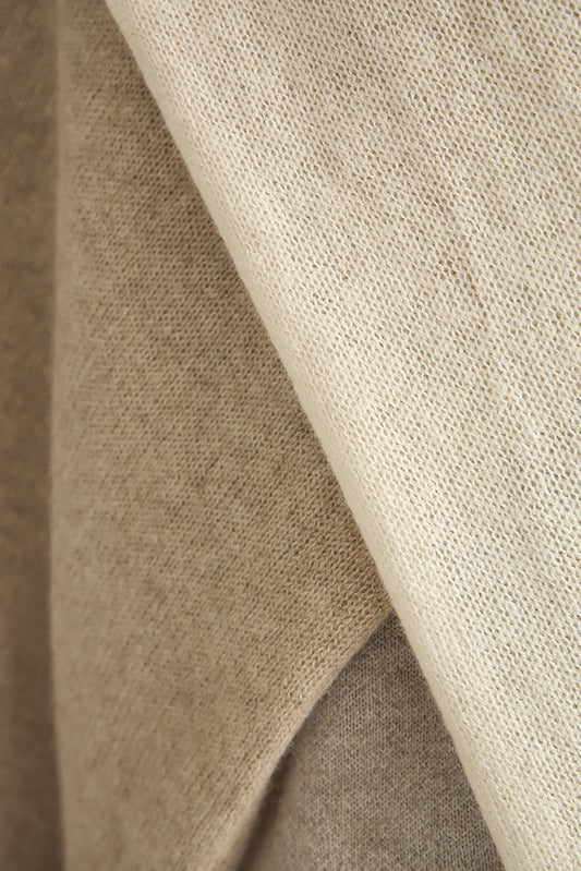 Close-up of beige shawl texture