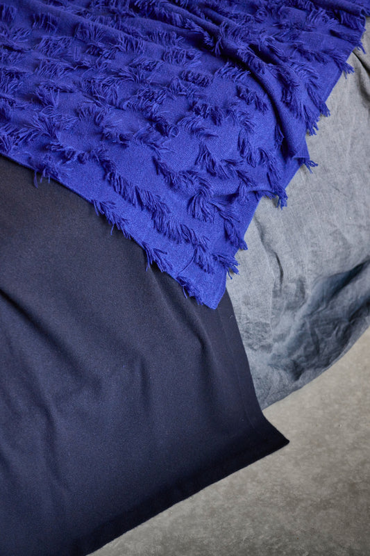 Poetra Throw in Ocean