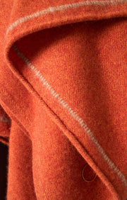 Sabra cashmere woven throw in colour Fire. 