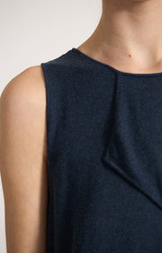 Woman wearing Sinca sleeveless cotton top in colour Indigo.