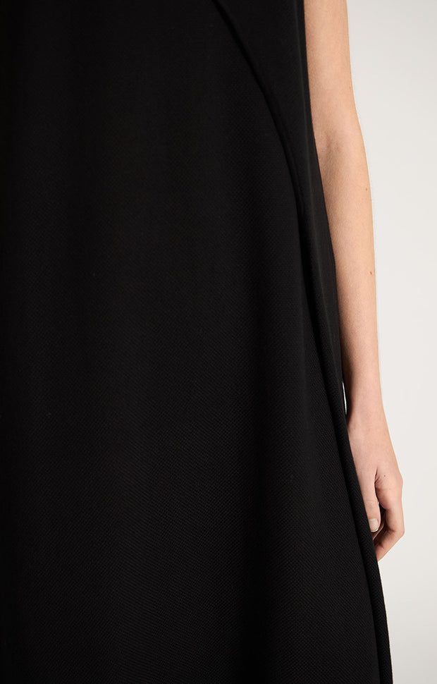 Woman wearing Vanda maxi cotton dress with side split in colour Black. 